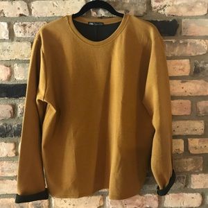 L Zara mustered yellow swooped sweater.